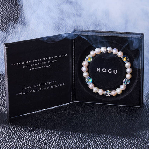 Ozeanphantom | Elfenbeinfarbene Süßwasserperle x Kristallschädel